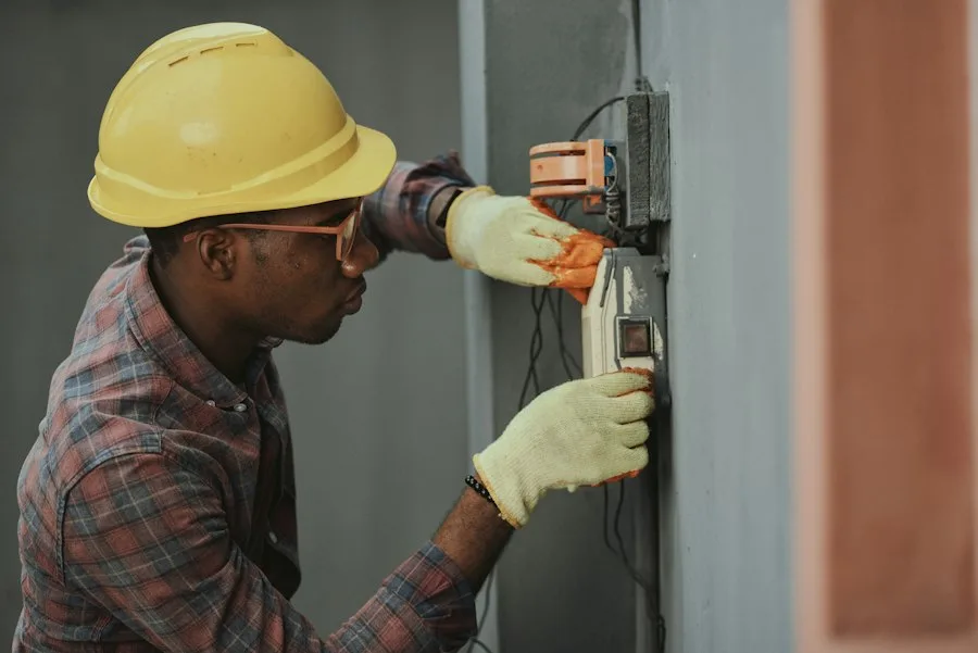 Appliance repair master technician diagnosing modern oven control unit